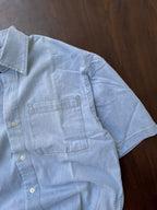 Powder blue denim half-sleeve shirt detail of side seam and chest pocket