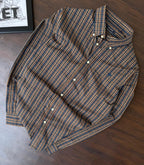 Mustard & navy plaid button-up shirt with collar and white buttons