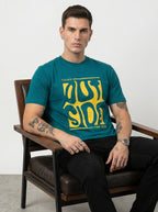 Teal green round-neck T-shirt with yellow melted box graphic on front
